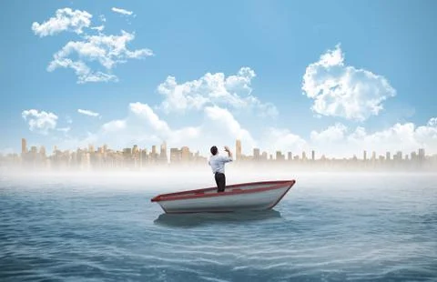 Composite image of businessman posing with arms up in a sailboat Ilustración de archivo