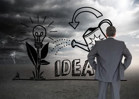 Composite image of businessman standing back to the camera with hands on hip Illustrazione stock