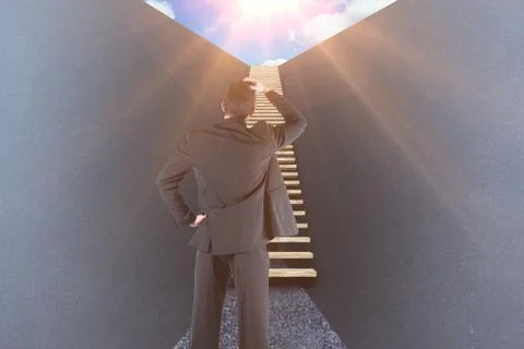 Composite image of businessman standing back to the camera with hand on head 3d Stock Photos