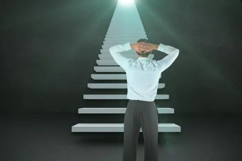 Composite image of businessman standing back to the camera with hands on head 3d Stock Photos