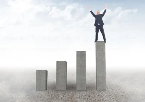 Composite image of Businessman standing on graph post raising his arms against Foto stock