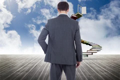 Composite image of businessman standing with hand on hip Stock Illustration