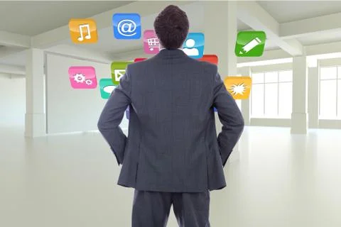 Composite image of businessman standing with hands on hips Stock Illustration