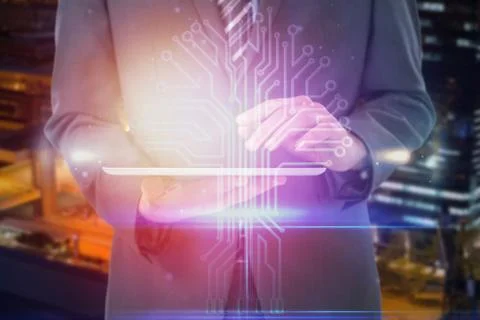 Composite image of businessman using digital tablet 스톡 사진