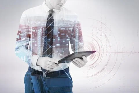 Composite image of businessman using digital tablet 3d 写真素材