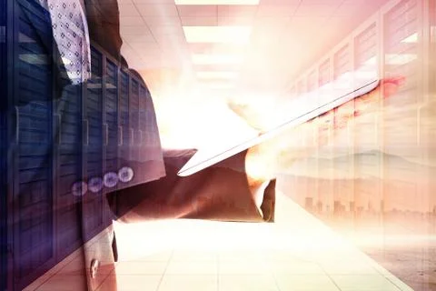 Composite image of businessman using his tablet pc Stockillustratie