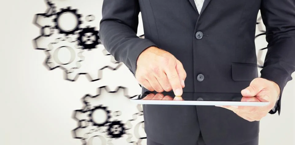Composite image of businessman using his tablet pc Stock Illustration