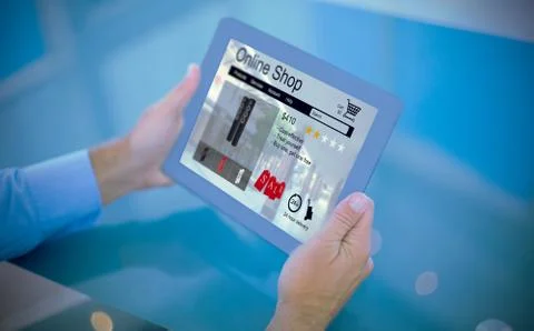 Composite image of businessman using his tablet Foto stock