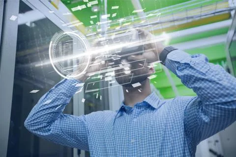 Composite image of businessman using virtual reality Stock Photos