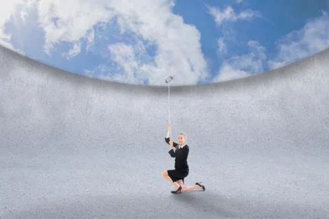 Composite image of businesswoman pulling down blue sky 스톡 일러스트