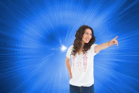Composite image of cheerful attractive brunette wearing casual clothes pointing 스톡 일러스트