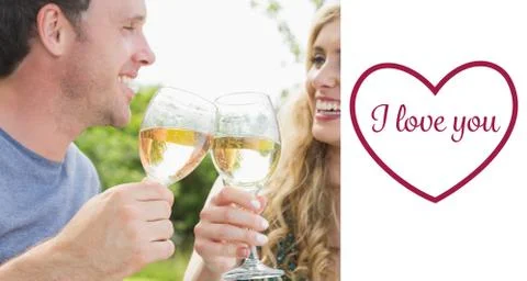 Composite image of cheerful couple toasting with white wine イラスト素材