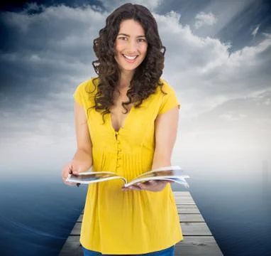Composite image of cheerful curly haired brunette reading magazine Stock Illustration