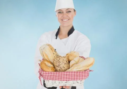 Composite image of Chef with bread against blue background Stock Photos