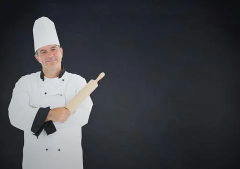 Composite image of Chef with rolling pin against navy background Stock Photos