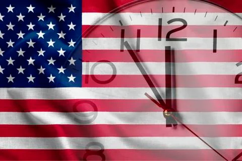 Composite image of clock and American flag Foto stock