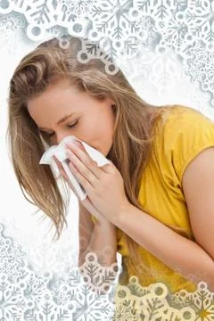 Composite image of close up of a blond young woman blowing Ilustração Stock