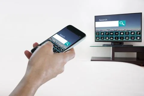 Composite image of close-up of hand holding mobile phone Stock Photos