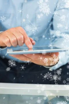 Composite image of close up of man holding and using tablet Illustrazione stock