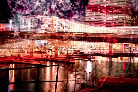 Composite image of colourful fireworks exploding on black background 写真素材