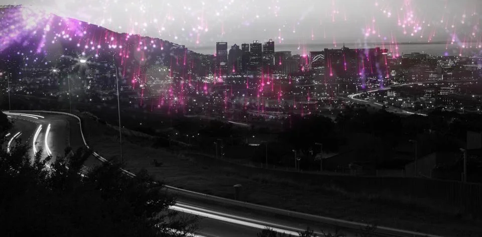 Composite image of colourful fireworks exploding on black background Foto stock