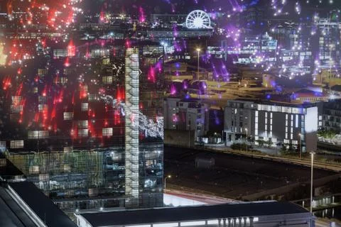 Composite image of colourful fireworks exploding on black background 写真素材