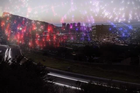 Composite image of colourful fireworks exploding on black background Stock Photos