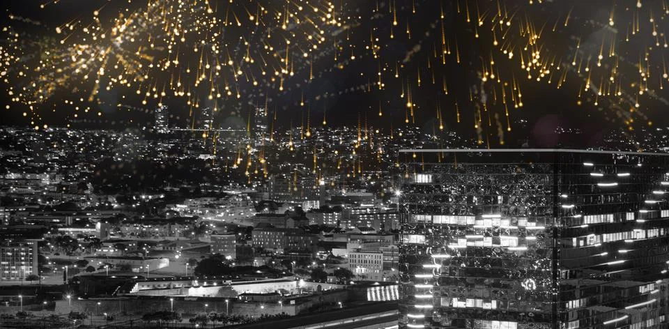 Composite image of colourful fireworks exploding on black background Foto stock