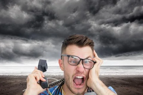 Composite image of computer engineer screaming while on call in front of open Illustrazione stock