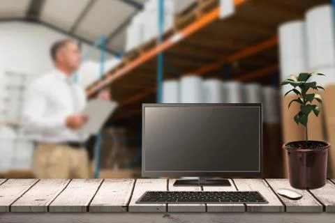 Composite image of a computer over a desk Stock Illustration