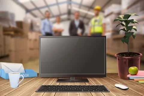 Composite image of a computer over a desk 스톡 일러스트