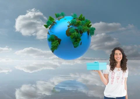 Composite image of content casual brunette holding a present Stock Illustration