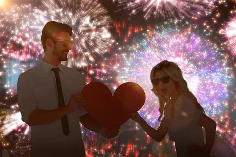 Composite image of cool young couple holding red heart Stock Photos