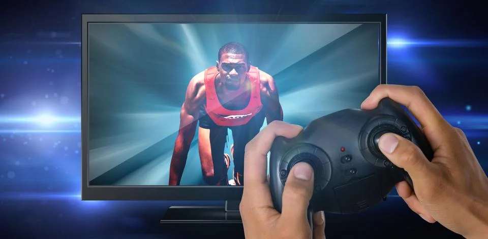Composite image of cropped image of hands holding controller 스톡 사진