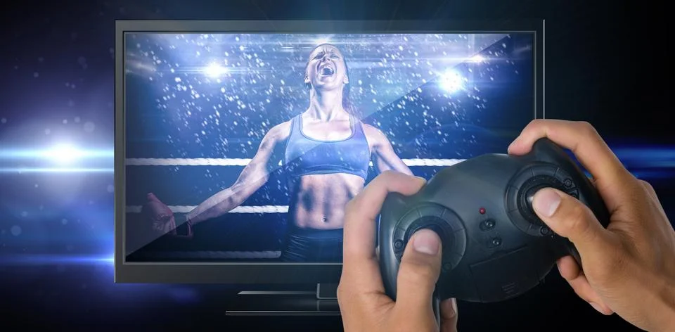 Composite image of cropped image of hands holding controller 스톡 사진
