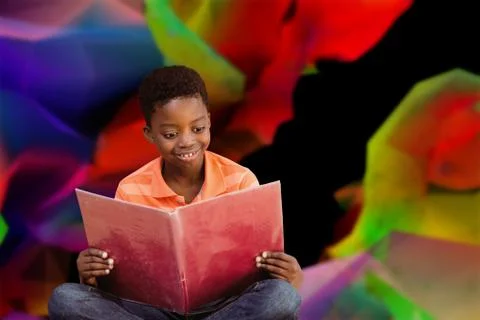 Composite image of cute boy reading book in library Stockfoto's