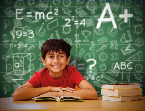 Composite image of cute boy reading book in library Foto stock