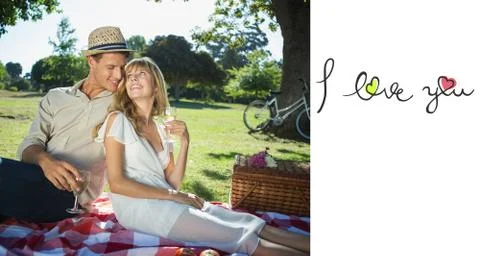 Composite image of cute couple drinking white wine on a picnic smiling at each Ilustração Stock