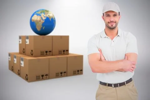 Composite image of delivery man standing arms crossed Foto stock