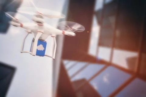 Composite image of digital image of a drone holding a cube Ilustración de archivo