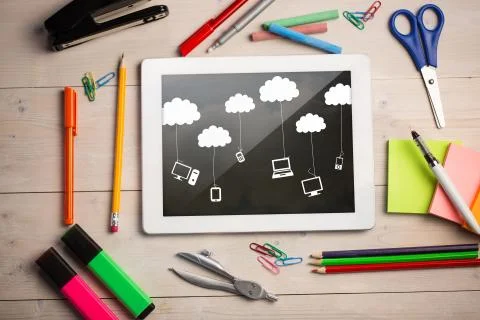 Composite image of digital tablet on students desk Stock Illustration
