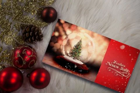 Composite image of digitally generated image of snow falling against christmas Stock Photos