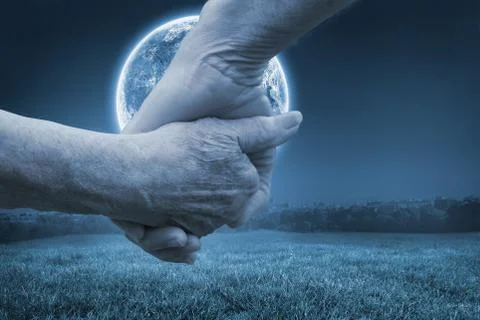 Composite image of elderly couple holding hands Foto stock