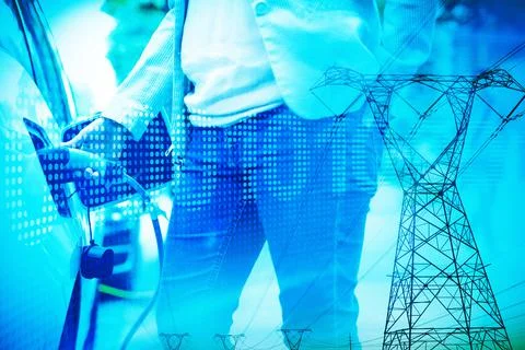 Composite image of the evening electricity pylon silhouette Foto stock