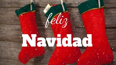 A composite image of falling snow with christmas stockings decoration Stock Footage 220777962