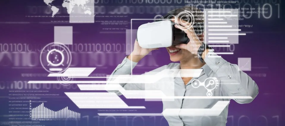 Composite image of female executive using virtual reality headset 스톡 사진