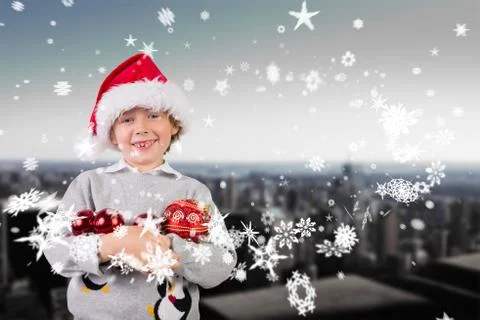 Composite image of festive boy smiling Ilustración de archivo