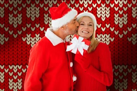 Composite image of festive couple 스톡 사진