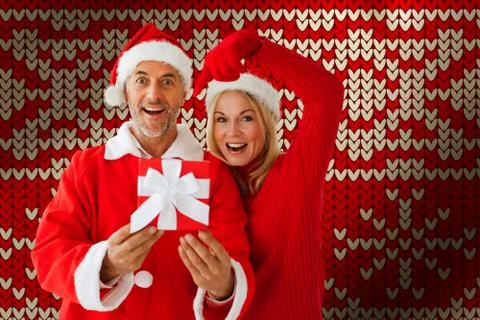 Composite image of festive couple 스톡 사진
