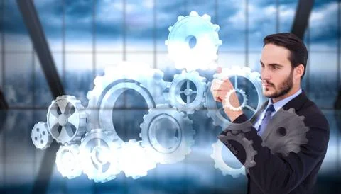 Composite image of focused businessman pointing in suit jacket Stock Illustration